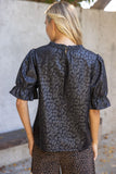 Addie Ruffled Puff Sleeve Animal Print Faux Leather VOY Top