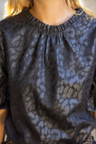Addie Ruffled Puff Sleeve Animal Print Faux Leather VOY Top